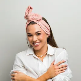 Bawełniana opaska twistband w różowe paseczki.